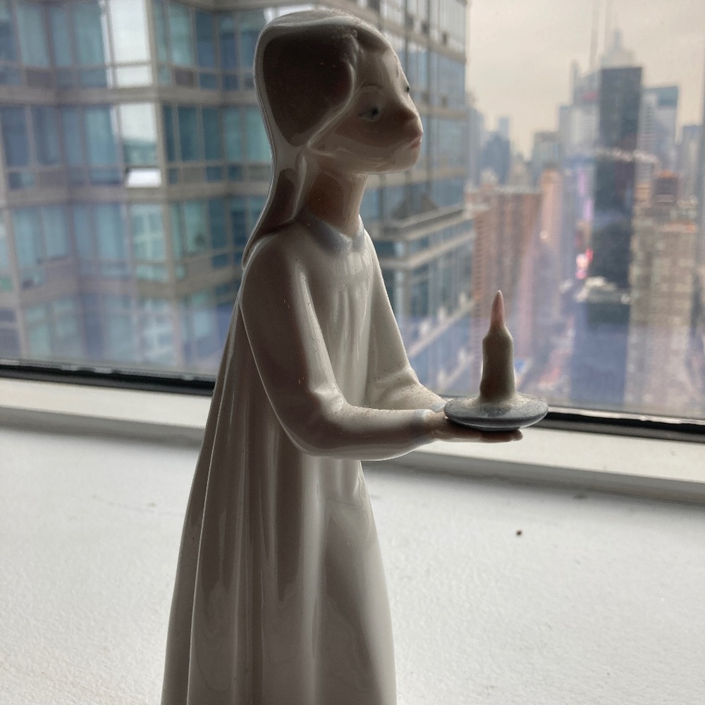 Lladro girl with candle